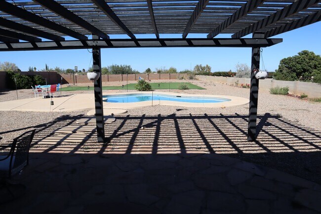 Building Photo - Home With A Pool and Much More!