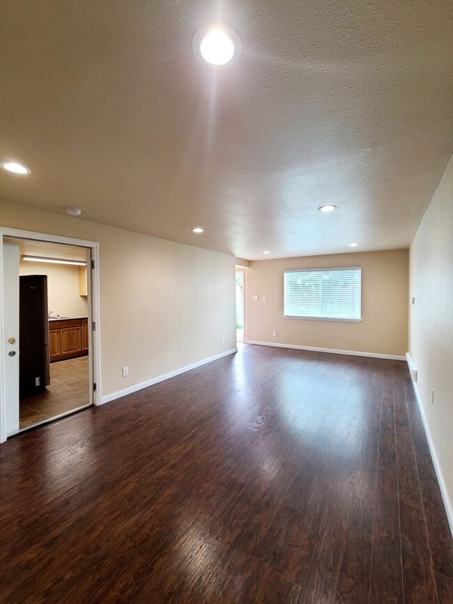 Building Photo - Totally remodeled. Impressive, open floor ...