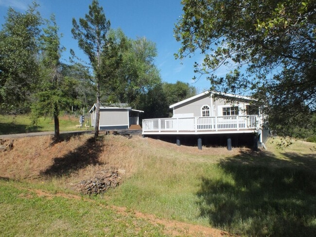 Building Photo - Rescue 4/3 retreat - includes separate cottage/office, 2 garage bays, RV pad and 5 acres with Sie...