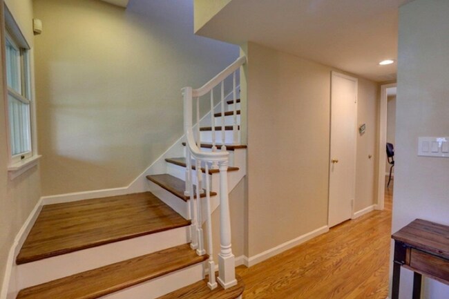 Building Photo - Executive 5BR Home with Private Backyard Retreat