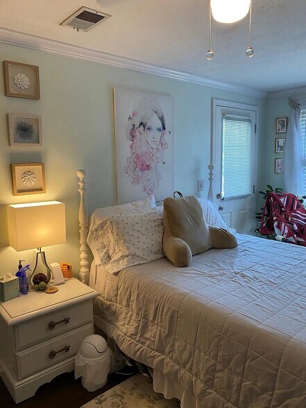 Main bedroom with door to balcony - 1483 Keys Crossing Dr NE