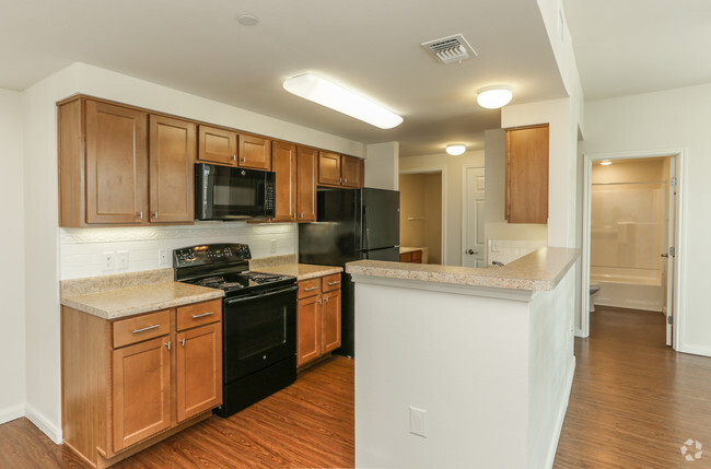 2BR, 2BA Kitchen - 920SF - East Meadows Apartments