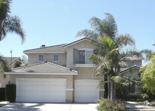 Building Photo - Spacious 4-Bedroom Home With 3-Car Garage ...