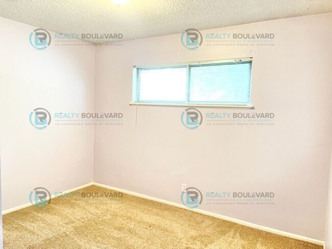 Building Photo - Cozy 3-Bedroom Home with Fenced Yard and G...