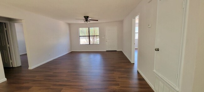 Building Photo - FRESHLY REDONE in 2023 - New floors, fresh...