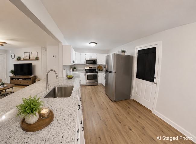 Building Photo - Large Fenced-in Backyard + Stainless Steel Appliances! Available August 5th!