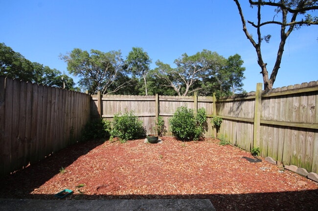 Building Photo - Southwest Pensacola Townhome Near NAS Pensacola with Granite Kitchen & Privacy-Fenced Patio
