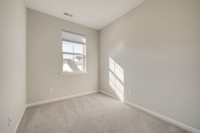 Building Photo - Contemporary, spacious 3-bedroom, 2.5-bath...