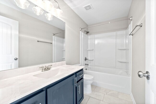 Building Photo - Pet Friendly Three Bedroom!