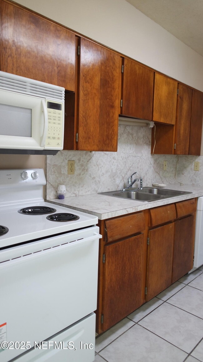 Building Photo - 7963 Lemans Dr