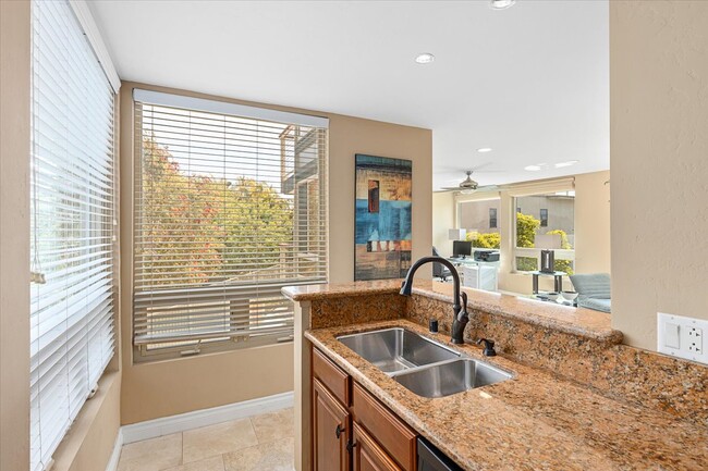 Sink area opens up to living room - 935 Genter St