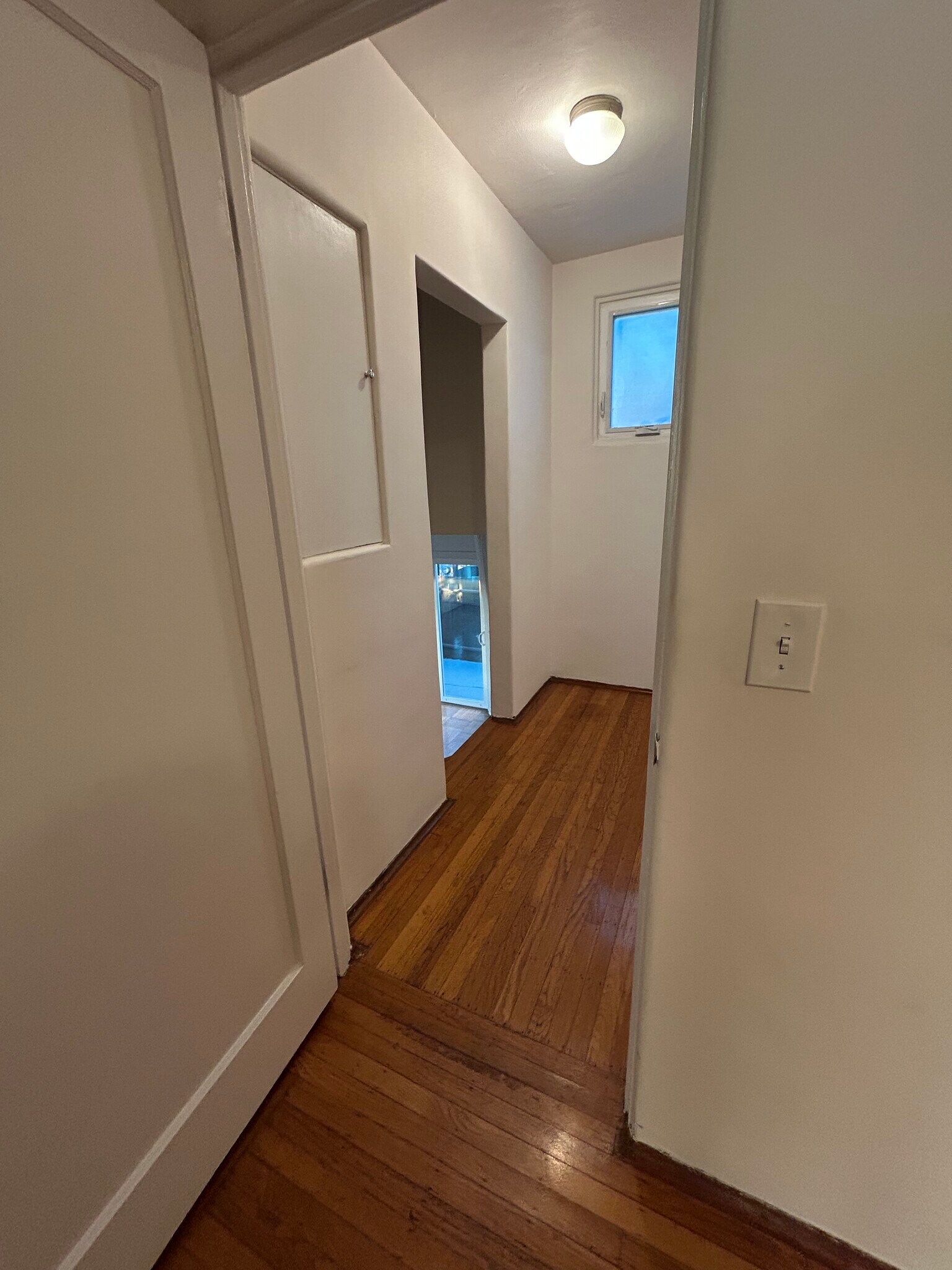 Hallway to downstairs (and bathroom). - 1903 Sacramento St