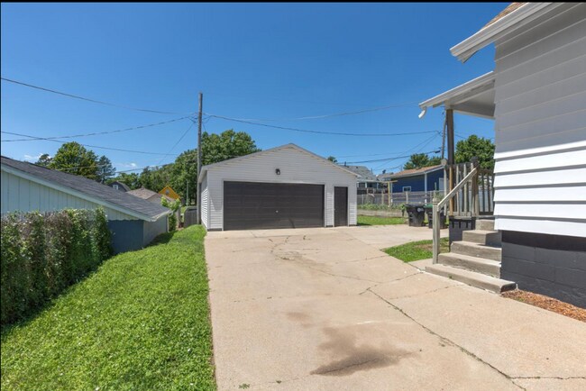 Building Photo - Updated South Omaha Home with Oversized Ga...