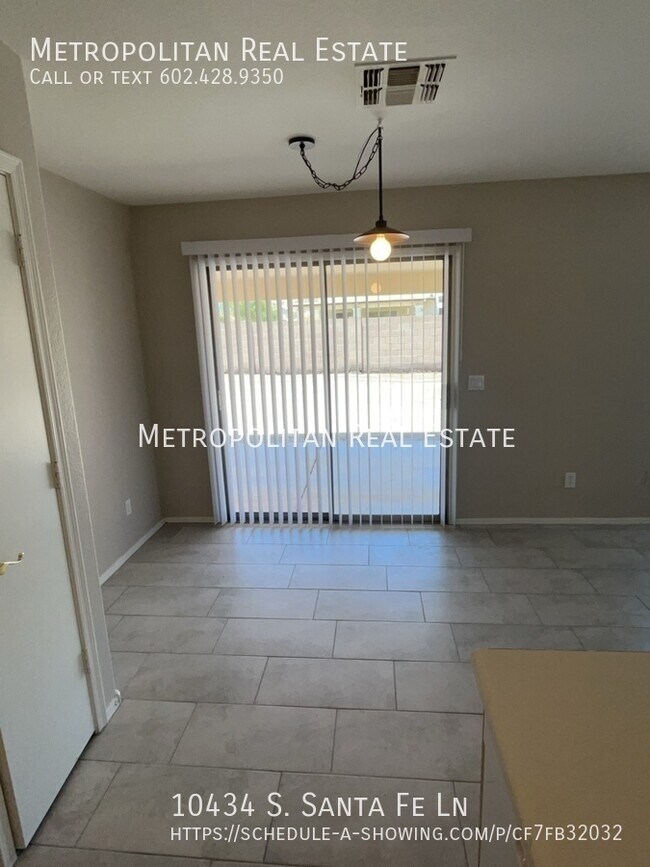 Building Photo - 10434 S Santa Fe Ln