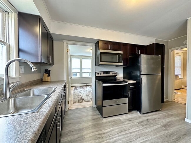 Building Photo - Available June 1st - Beautifully Renovated 4 Bed 1 Bath w/ Garage