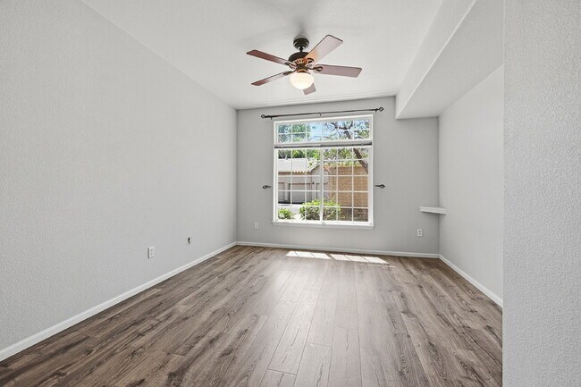 Building Photo - $1,745.95 - Ground-Level 1 Bed + Flex Room | 1.5 Bath Condo with Community Pool