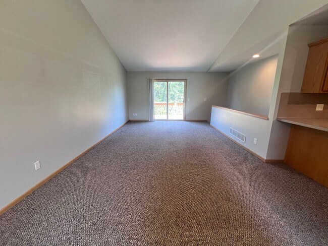 Building Photo - Spacious Duplex in Walker! Two Stall Garage!
