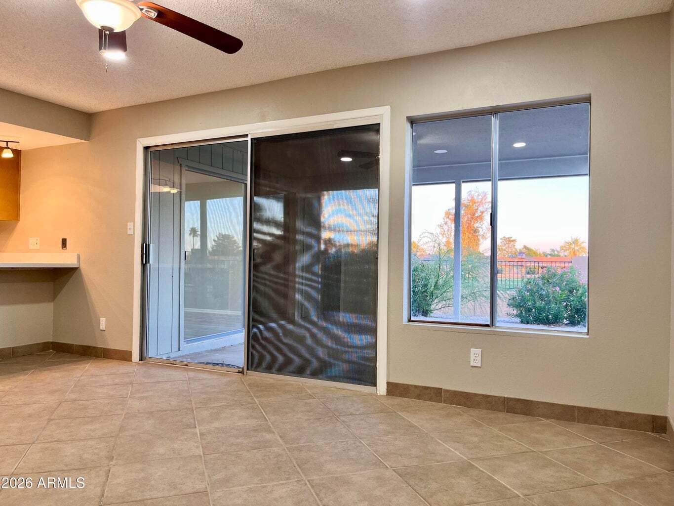 Slider to outside covered patio - 11625 S Mohave St