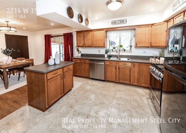 Building Photo - Spacious 5-Bedroom Home with Solar Panels ...