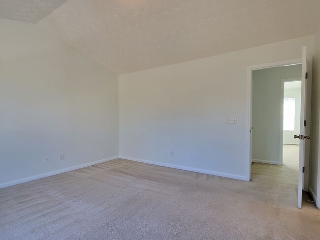 Building Photo - Experience modern living in this stunning two-story townhome! Awesome School District