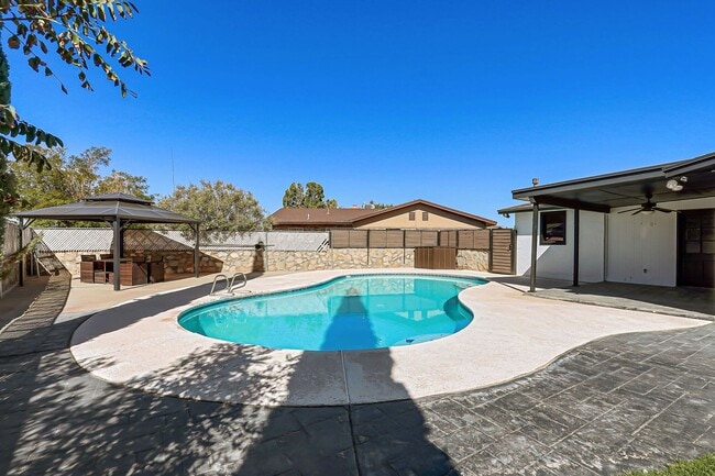 Building Photo - beautiful swimming pool and backyard oasis! fully remodeled home new appliances !