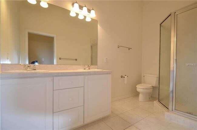 master bathroom-remodeled shower and new toilet installed - 4210 W Gray Street Unit 1