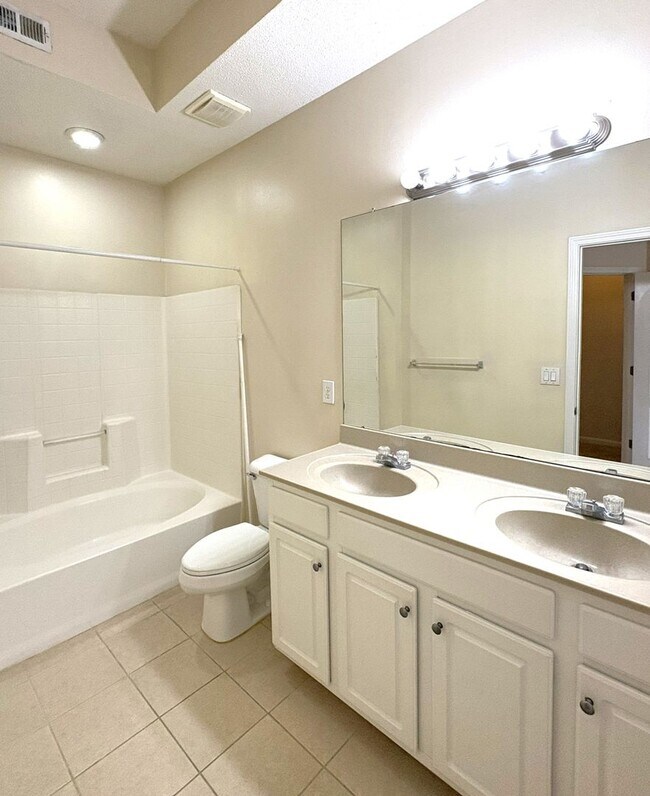 Building Photo - Check out this beautiful 3 Bedroom, 2 Bath with Volume ceilings!