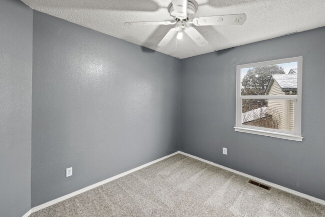 Building Photo - Charming Two-Story Home with Fenced Yard & Cozy Fireplace — Pet-Friendly!