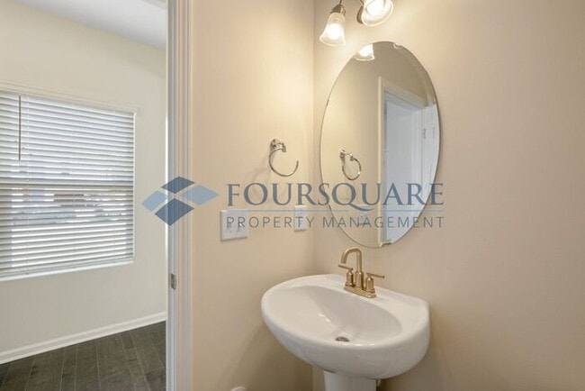 Building Photo - End-Unit Townhome with Loft, Open Floor Plan & Patio, Conveniently Located Near Dining, Shopping,...