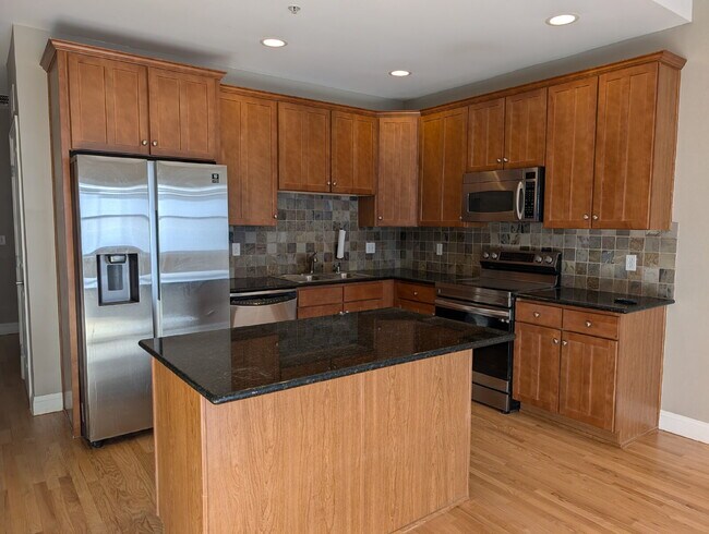 Building Photo - Chic Urban Living: Spacious 2-Bed Condo in Denver with 2 Reserved Garage Spaces!