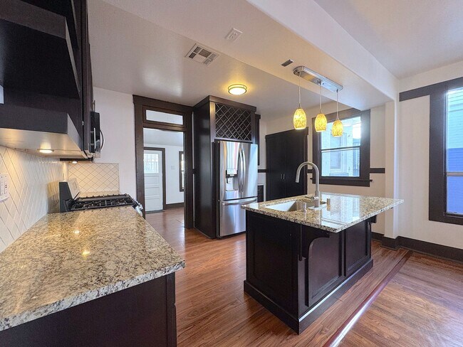 Building Photo - Updated Home with Historic Charm! 3bed/2 bath Refrig A/C across from Park! Water Included!