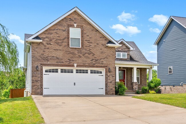 Building Photo - Pet Friendly Three Bedroom with Bonus!