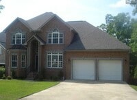 Building Photo - Lake Front Luxury in Chapin!