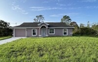 Building Photo - 3/2/1 Single Family Home Available – Cozy,...