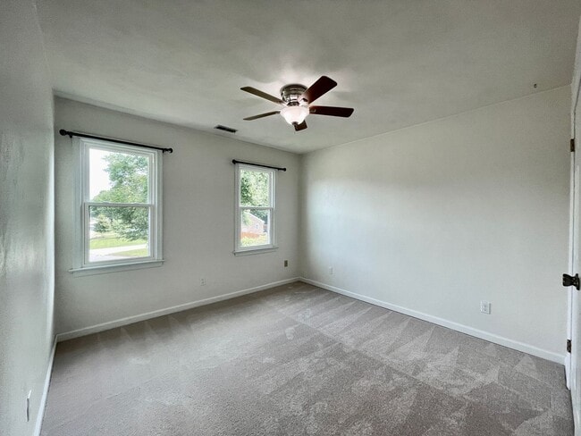 Building Photo - Available NOW! A 4-6 Bedroom Home! Attache...