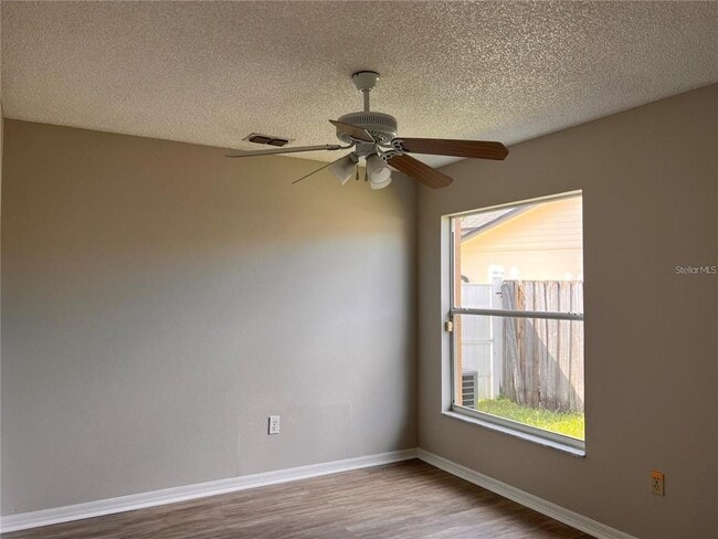 Building Photo - 8013 Gamboge Ct