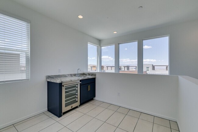 Building Photo - Stunning 4-Level Townhome in Inspirada | R...