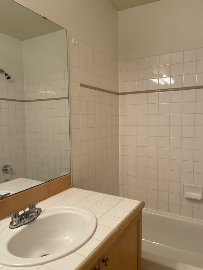 Building Photo - Bright, Spacious, Updated Condo with Separ...