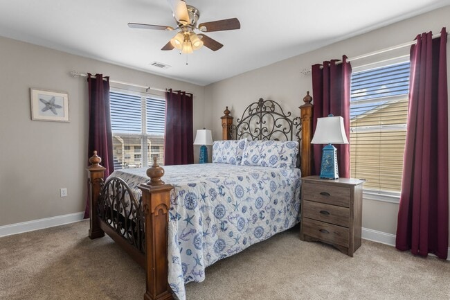 Building Photo - Welcome to Coastal Living at Harbor Landing Condominiums!