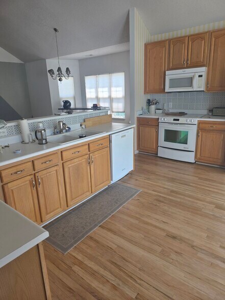 Kitchen, two pantrys - 8803 Whaley Cir