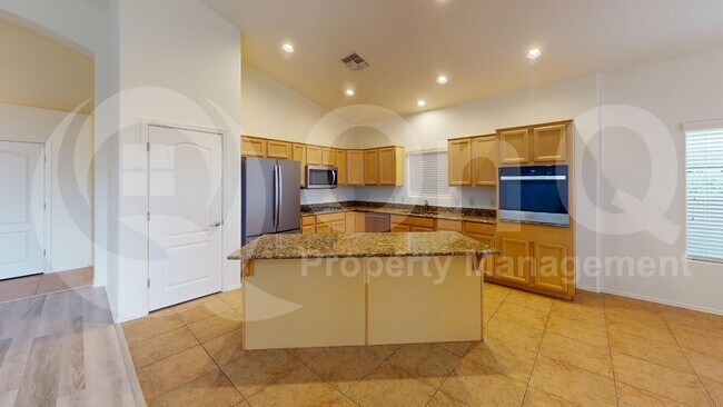 Building Photo - 11874 N Verismo Dr