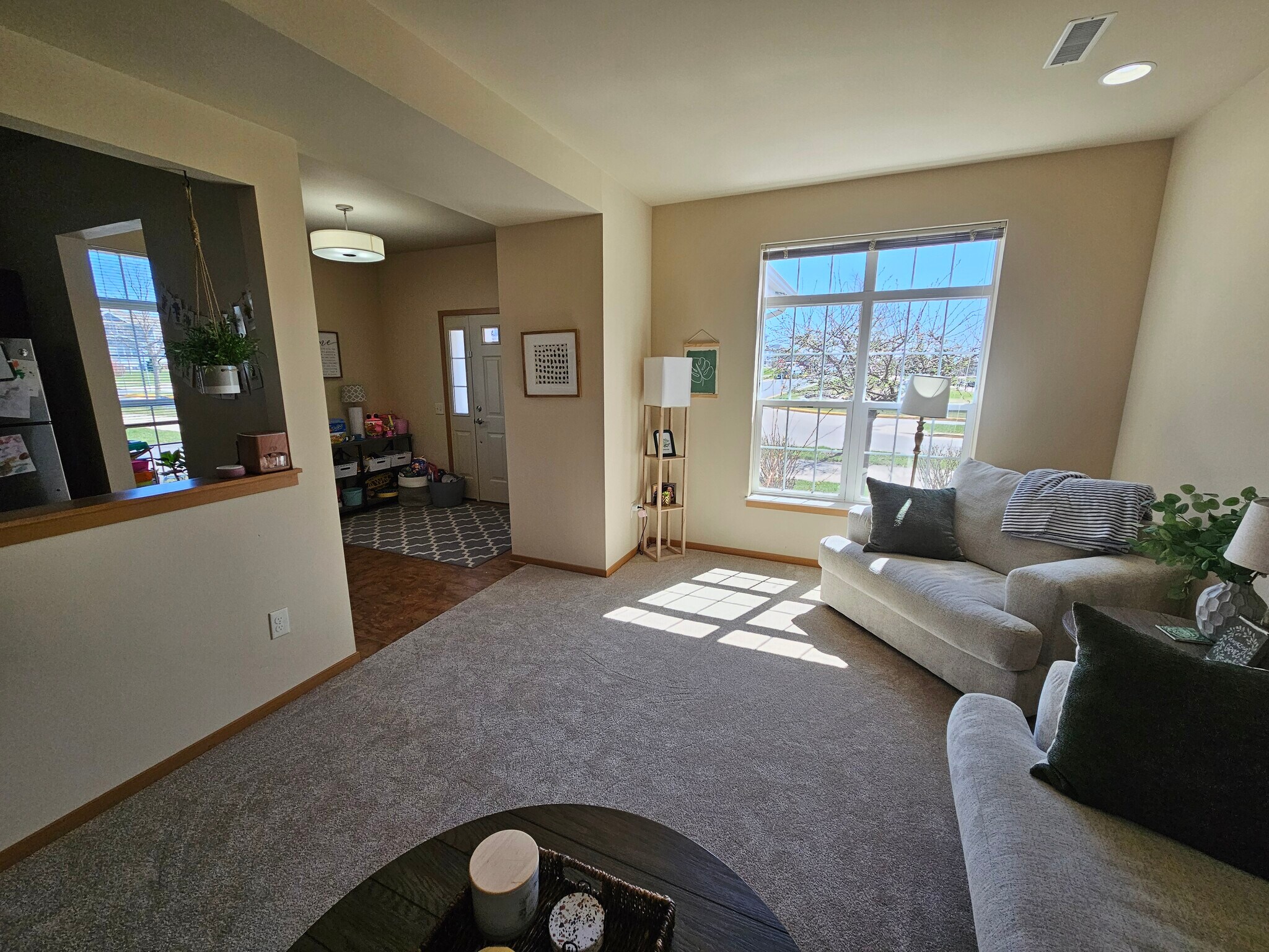 Living Room and front entry - 4868 Innovation Dr