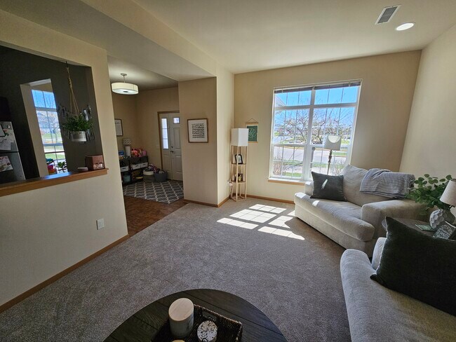 Living Room and front entry - 4868 Innovation Dr