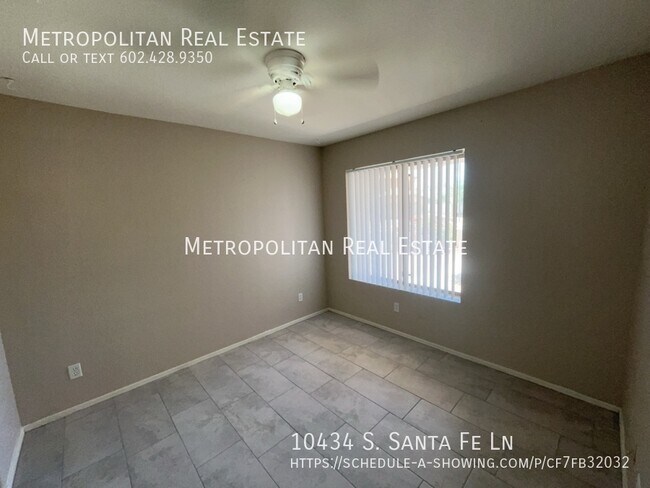 Building Photo - 10434 S Santa Fe Ln