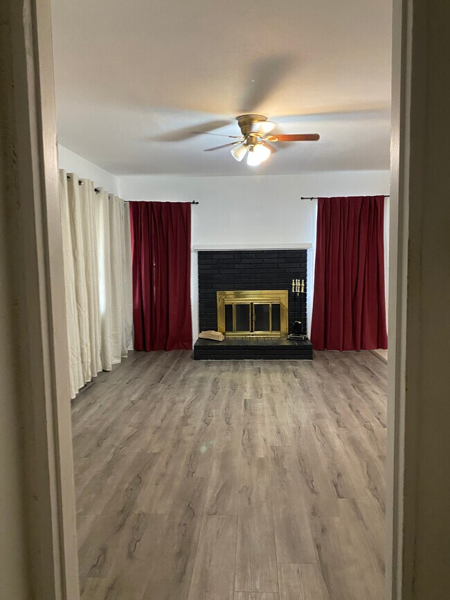 LIVING ROOM WITH FIREPLACE - 45127 Division St