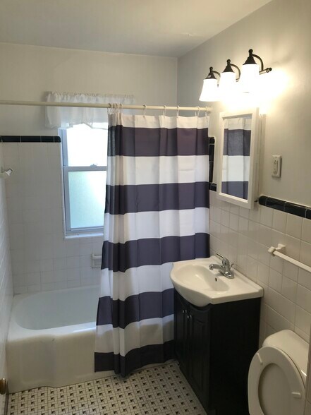 Updated bathroom - new windows - 7922 W Center St