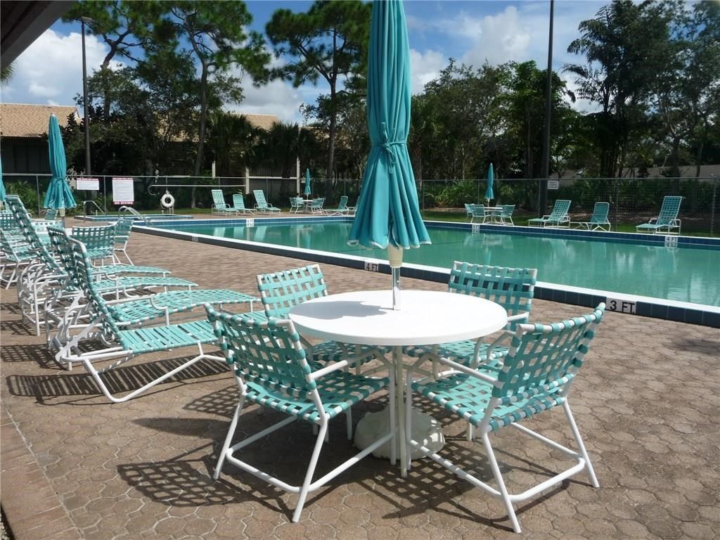 Heated community pool. - 1455 SW Silver Pine Way