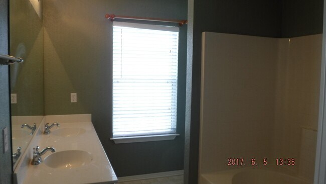 Building Photo - Two Bedroom, Two and half Bath Townhome