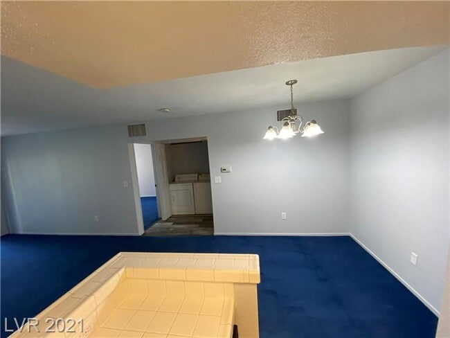 Building Photo - Charming 1-Bedroom Condo in Gated 89128 Co...