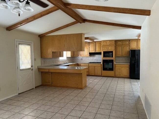 Building Photo - Beautiful home on a large corner lot with RV parking